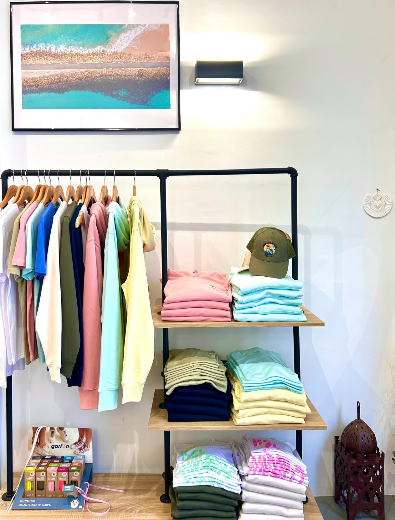 Picture from shelves presenting clothes inside the shop in Calle Silos 7 Tarifa
